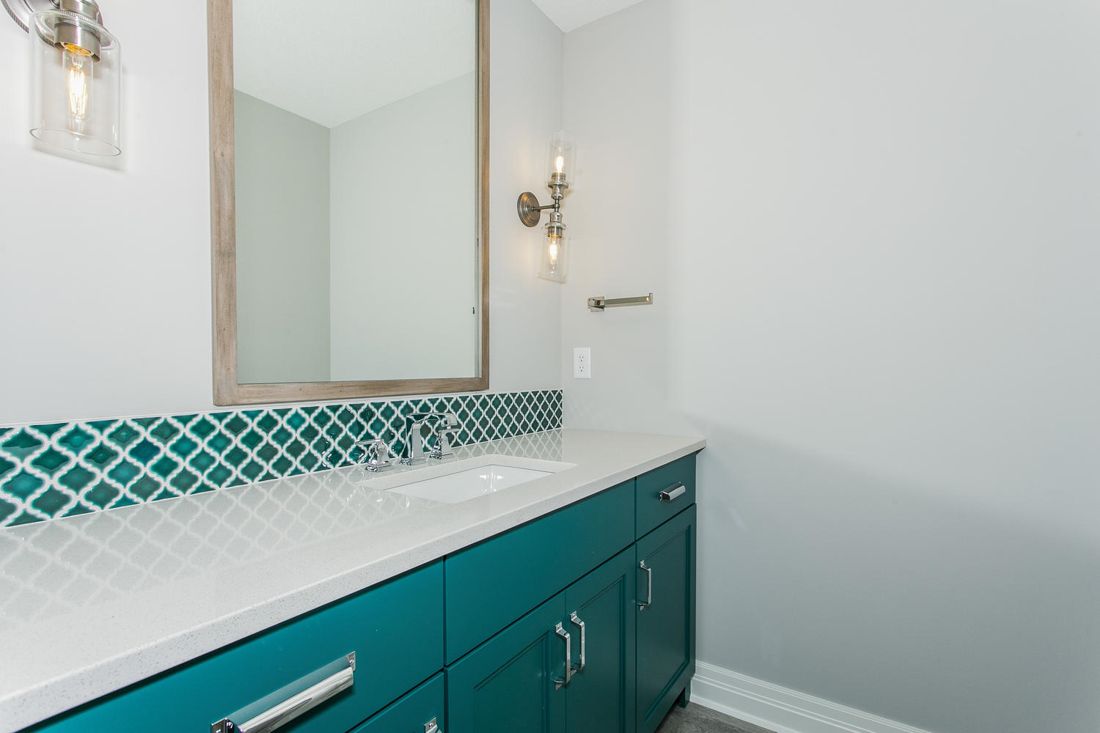 Evoke vanity in a teal paint